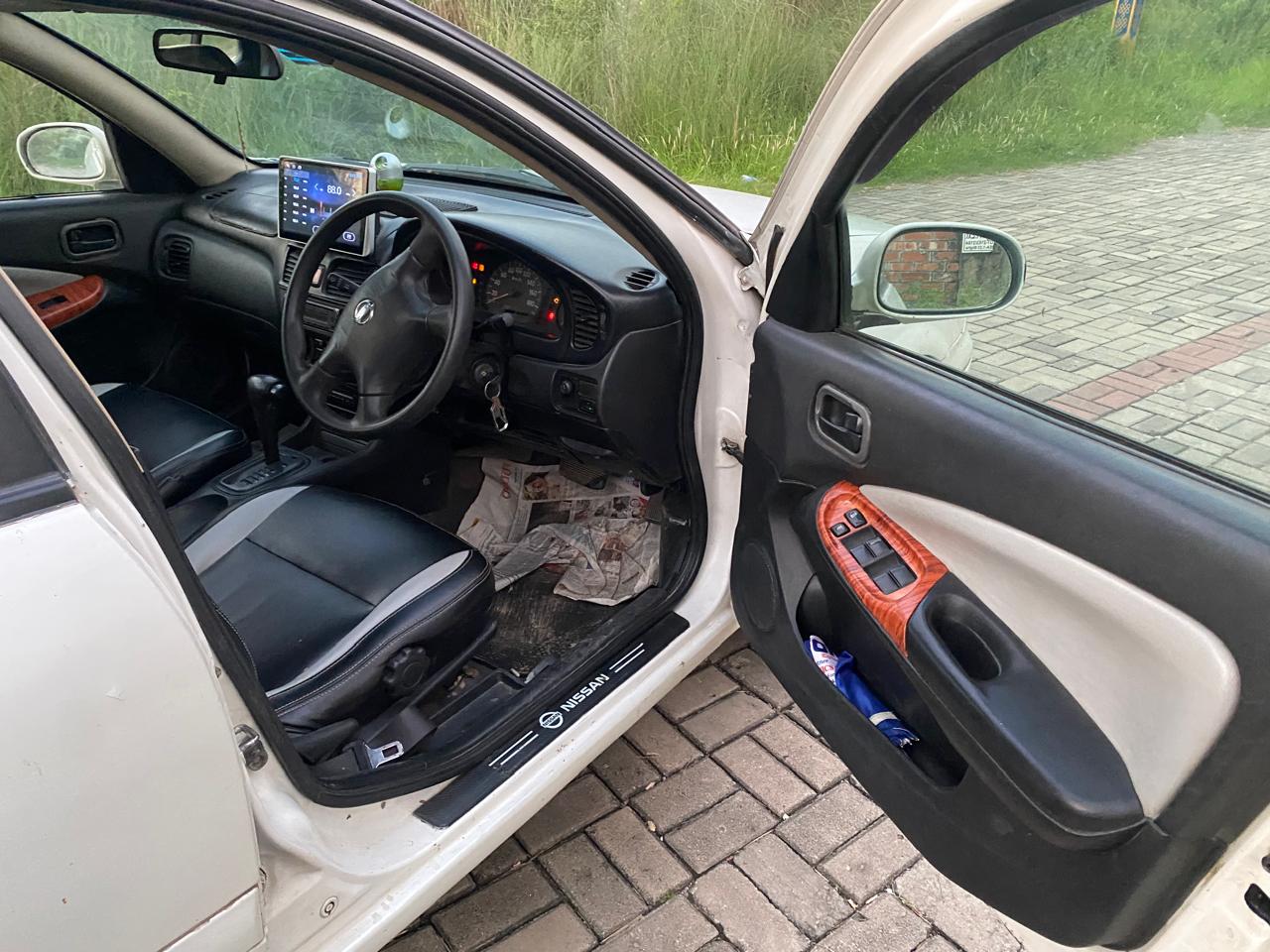 
								Nissan Sunny 2004 full									